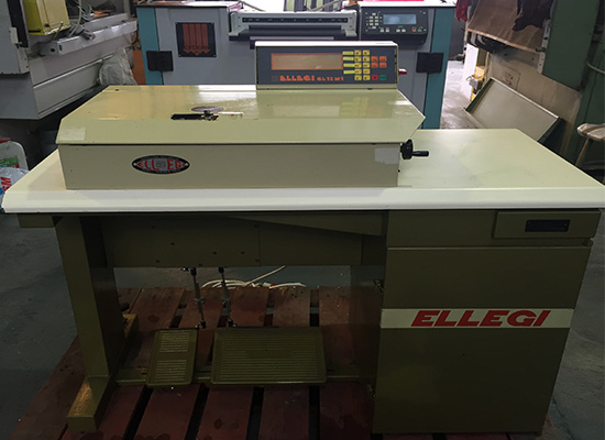 Photo of an Ellege GL12M3 computer skiving machine Industrial Sewing Machines