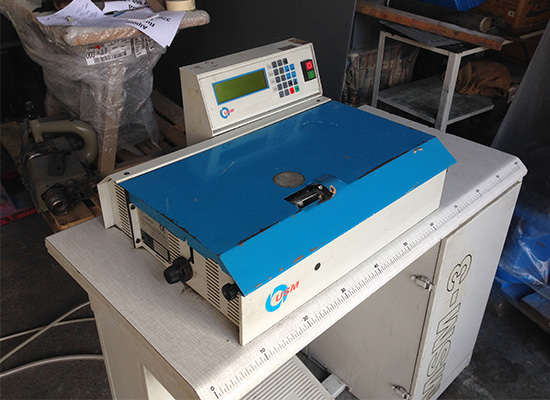 Photo of an Ellege GL12 industrial skiving machine Industrial Sewing Machines
