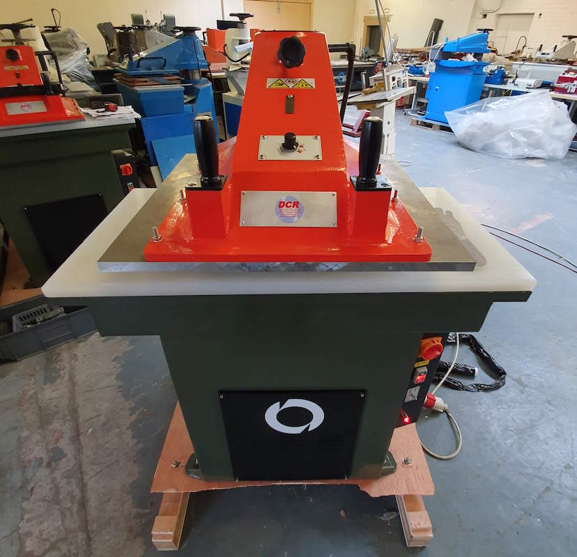 Photo of an DCR-27T Clicker Press Orange & Green Industrial Sewing Machines