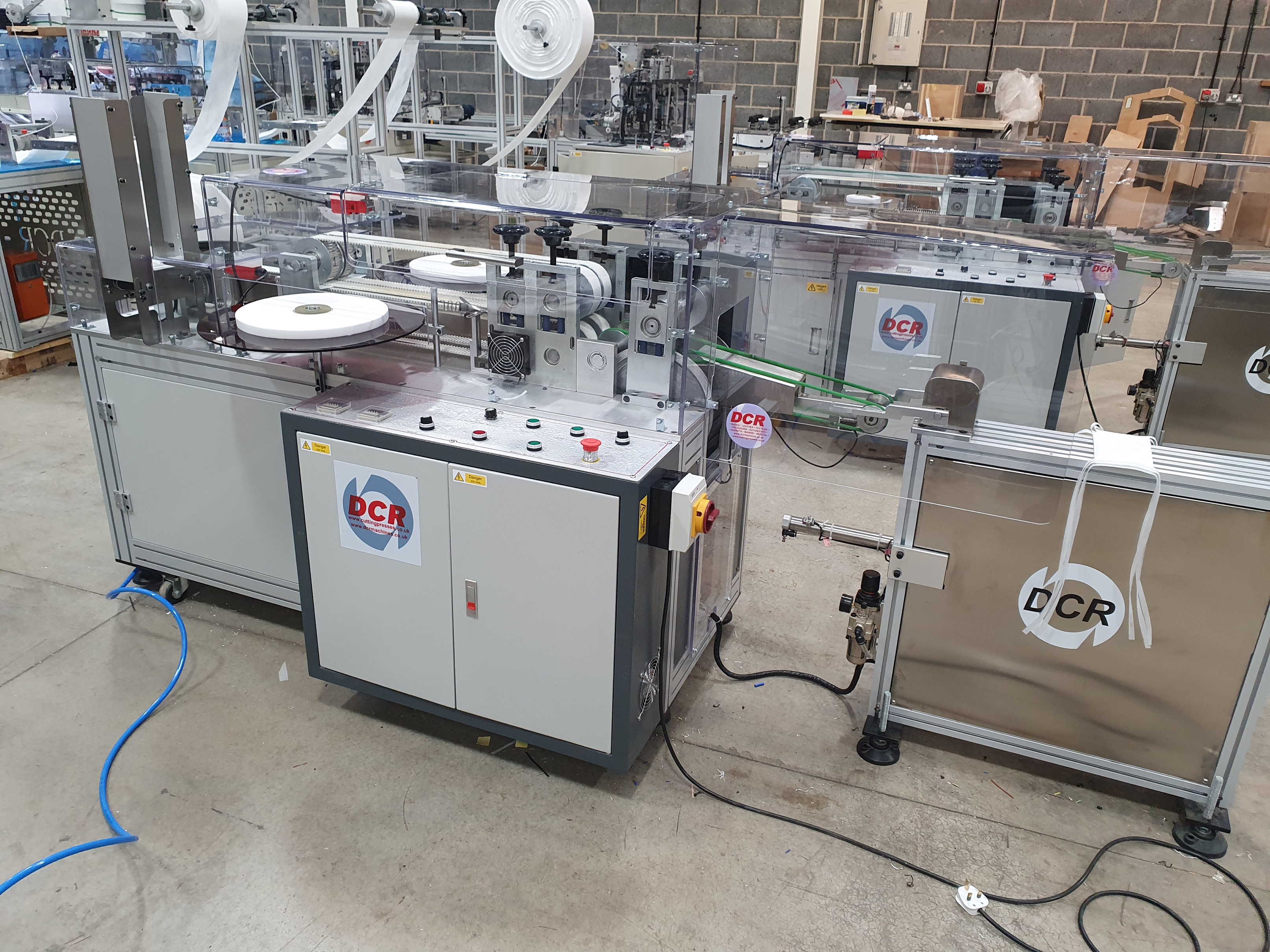 Photo of an DCR-AET AUTOMATIC EAR TIE MACHINE Industrial Sewing Machines